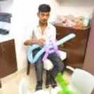 Twisting balloons and creating joy at the kids' birthday party