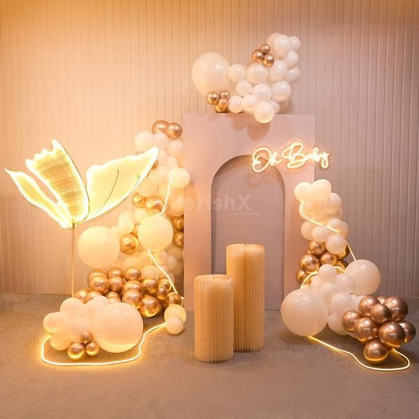 Celebrate with elegance: butterfly-themed decor and glowing neon lights