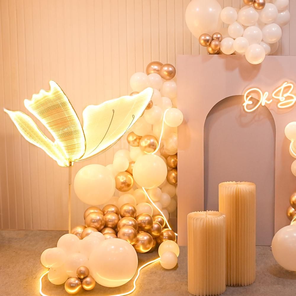 Every detail sparkles with love in our butterfly and neon light decor