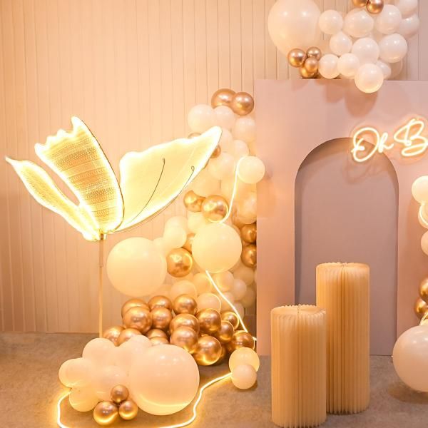 Every detail sparkles with love in our butterfly and neon light decor