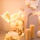 Every detail sparkles with love in our butterfly and neon light decor