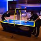 The Turbo Air Hockey Table Setup Keeps Guests Engaged During The Party And Crafts Memories.