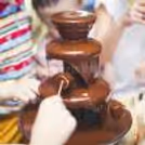 3259	A delicious chocolate fountain adds extra sweetness to the kids' birthday celebration.