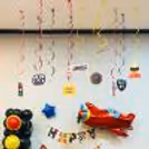 Package Decoration - Transport Bunting, Swirls with Charaters, Cake Topper and Cup Cake Toppers are added