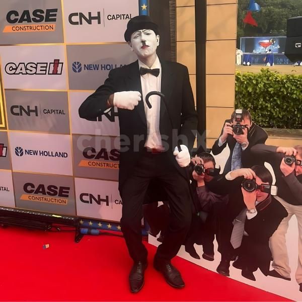 Live Charlie Chaplin character entertaining kids at a birthday party