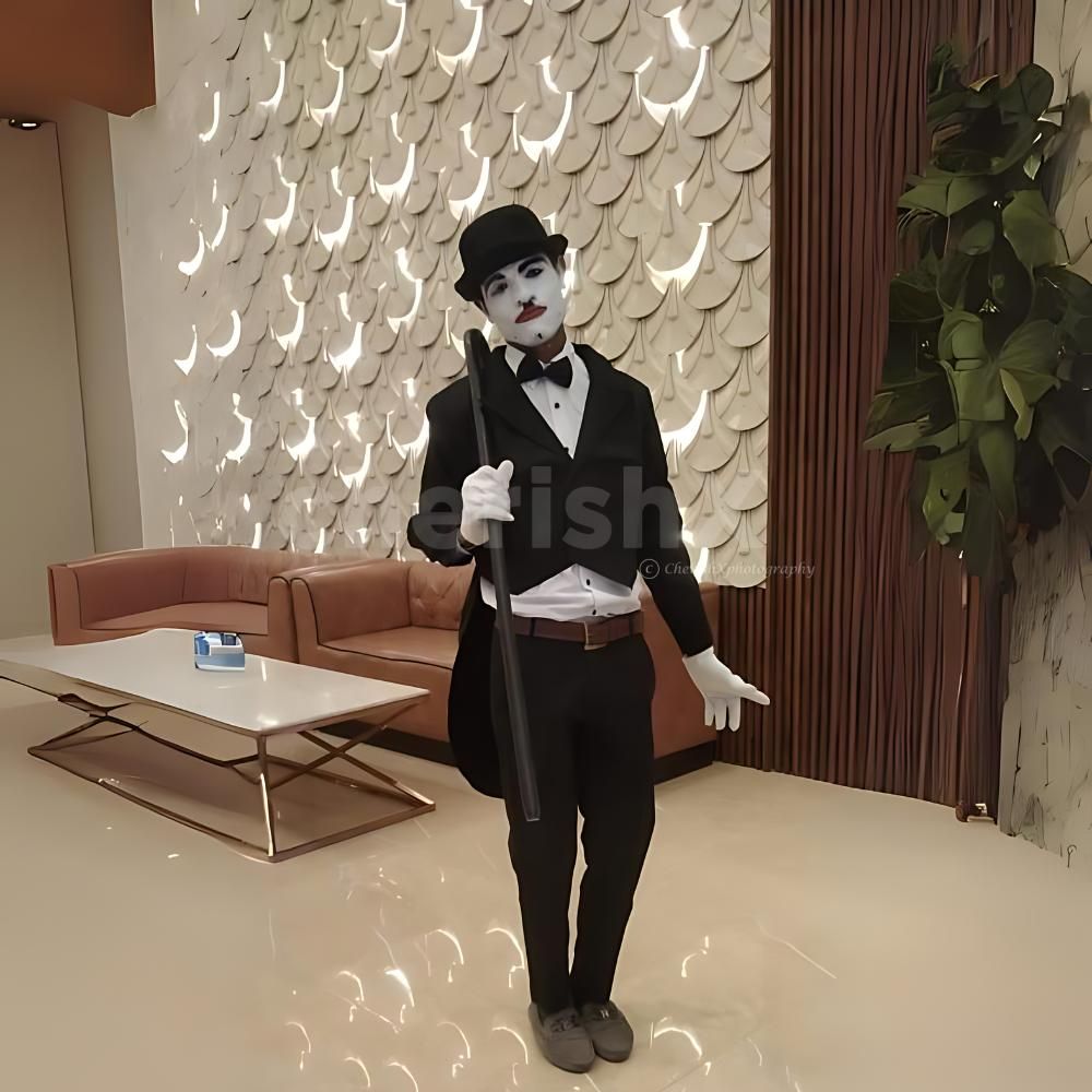 Charlie Chaplin character bringing laughter and fun to a kids' party