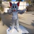 Kids enjoying mischievous fun with their favorite live Tom character
