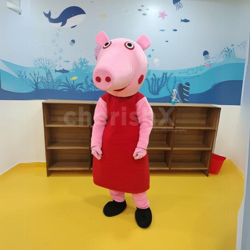 A live Peppa Pig character bringing fun and laughter to the birthday party