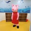 A live Peppa Pig character bringing fun and laughter to the birthday party