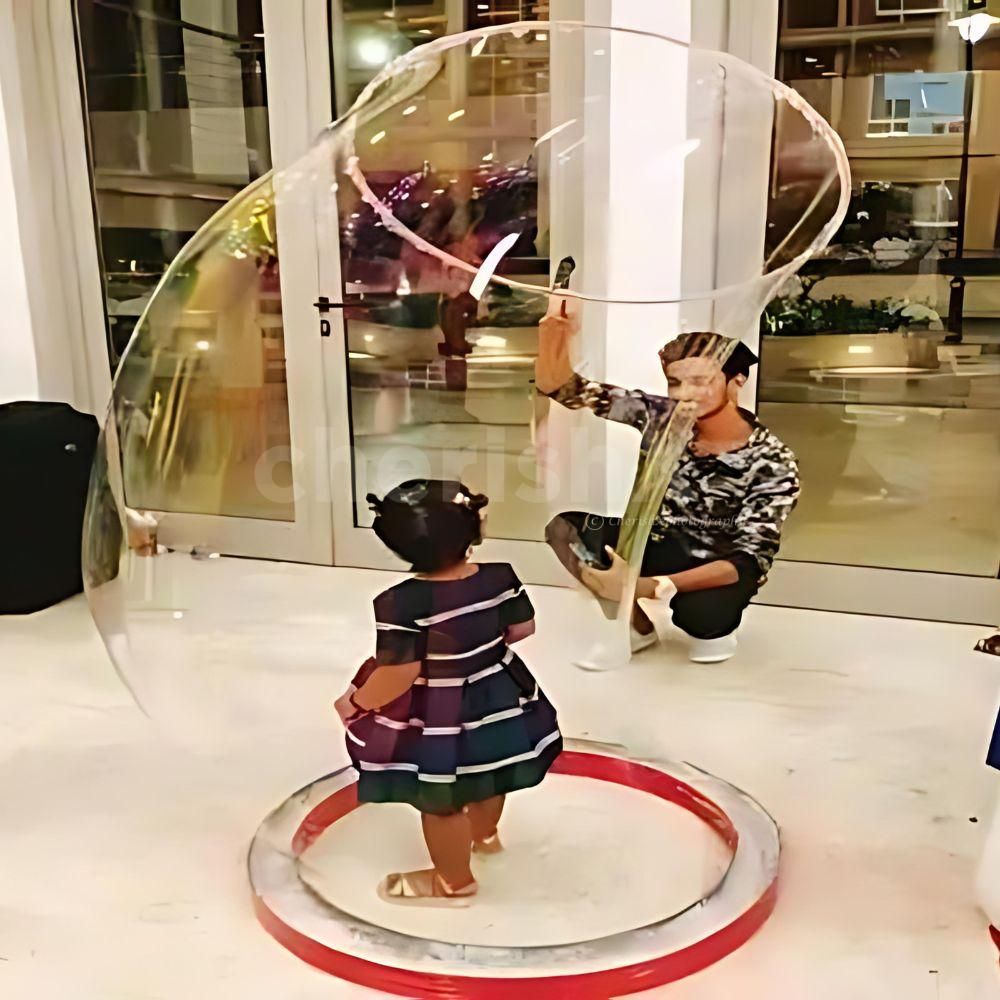 Kids delight in the magic of bubbles at our Bubble Game Show