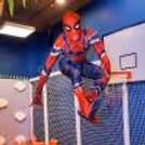 Spiderman interacting with young fans