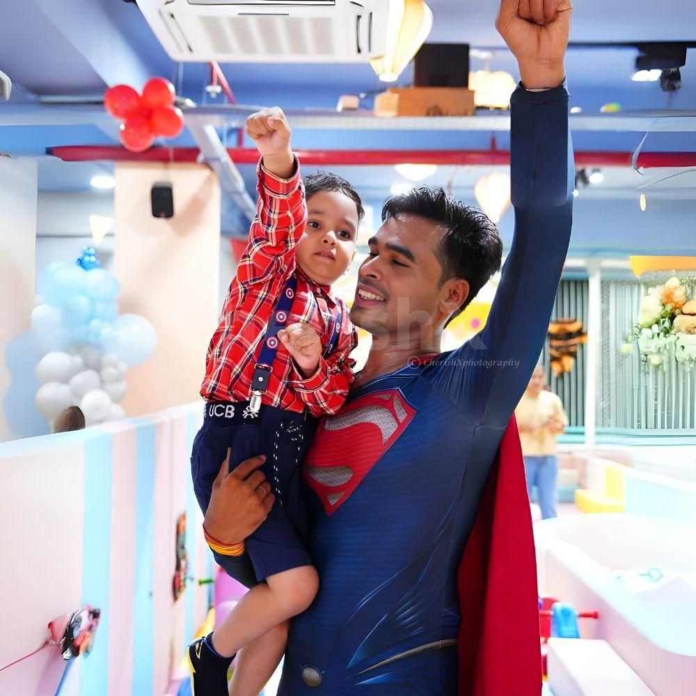 Superman celebrating the cake-cutting ceremony