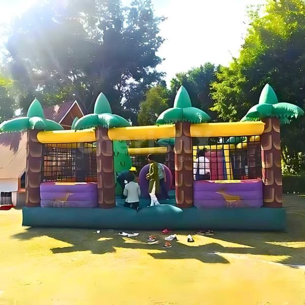 Kids having a blast in the Jungle Theme Bouncy – 20x24 ft of wild fun