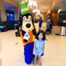Celebrate with Disney's Goofy at your child's party, offering a delightful mix of humor and entertainment for young fans
