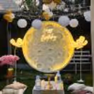 Tabletop Elegance - Low tables adorned with candles, flower vases, and brass lamps for a magical ambiance.