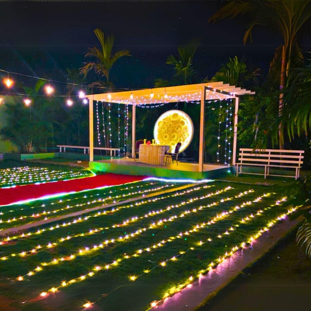 Fairy Light Magic - Twinkling fairy lights create a dreamy atmosphere on the lawn.