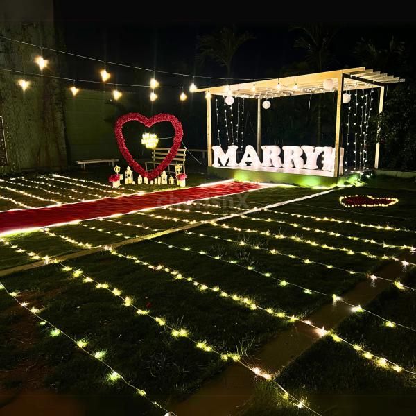 Enchanted Pathway - Walk the red mat pathway surrounded by fairy lights and LED candles.