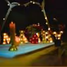 Candlelit "I Love You" and heart-shaped rose petal decoration for a magical touch