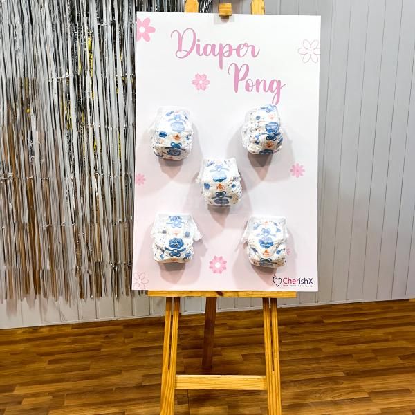 Diaper pong game ideas for baby shower funny