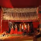 Kids enjoy a colorful and entertaining traditional Rajasthani puppet show.