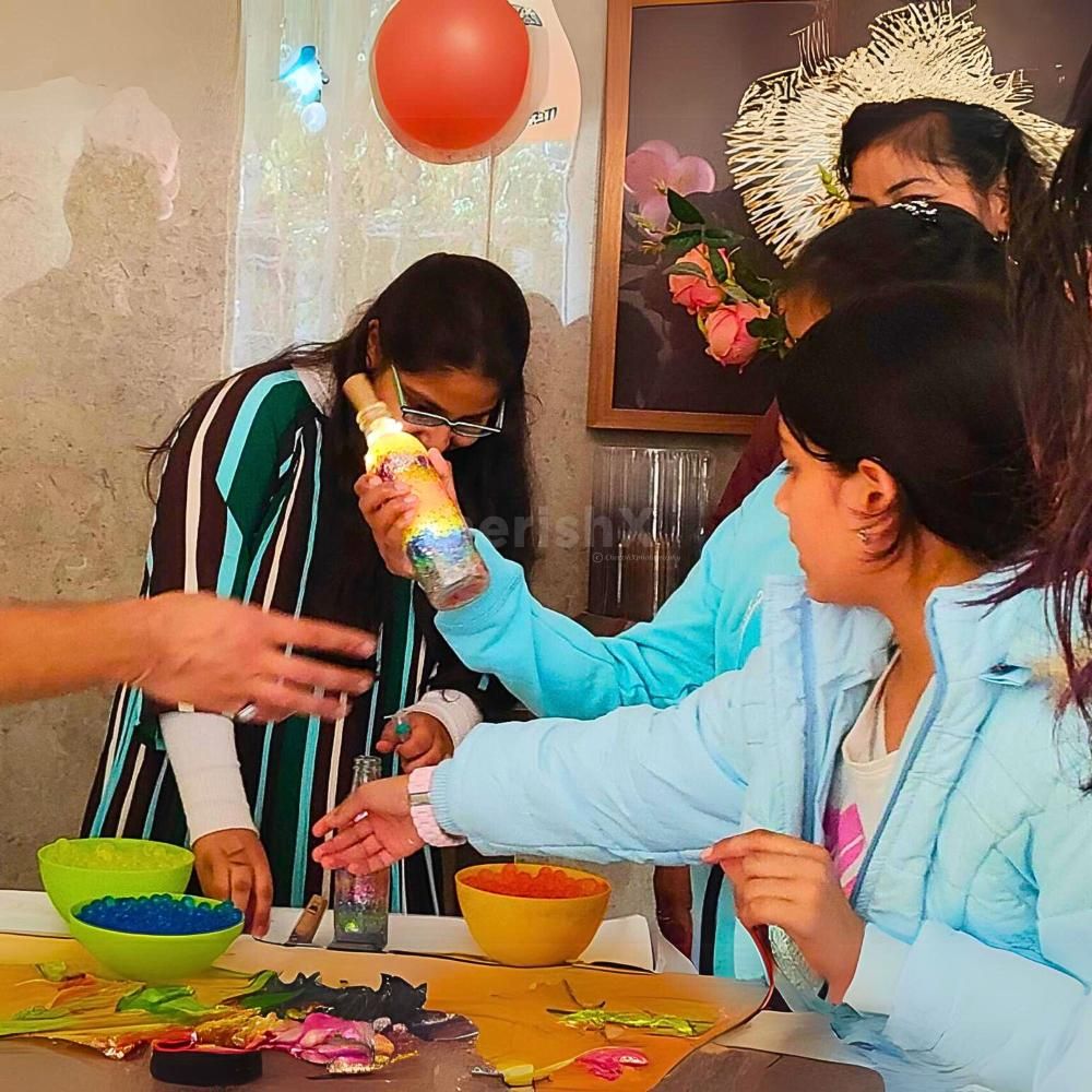 Kids exploring science with a Light Up Bottle project!