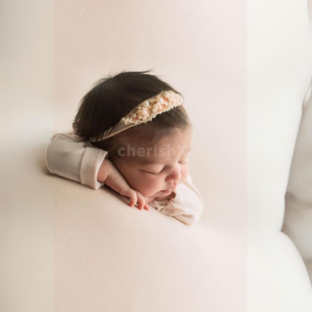 Newborn magic: a delicate dance of innocence and wonder