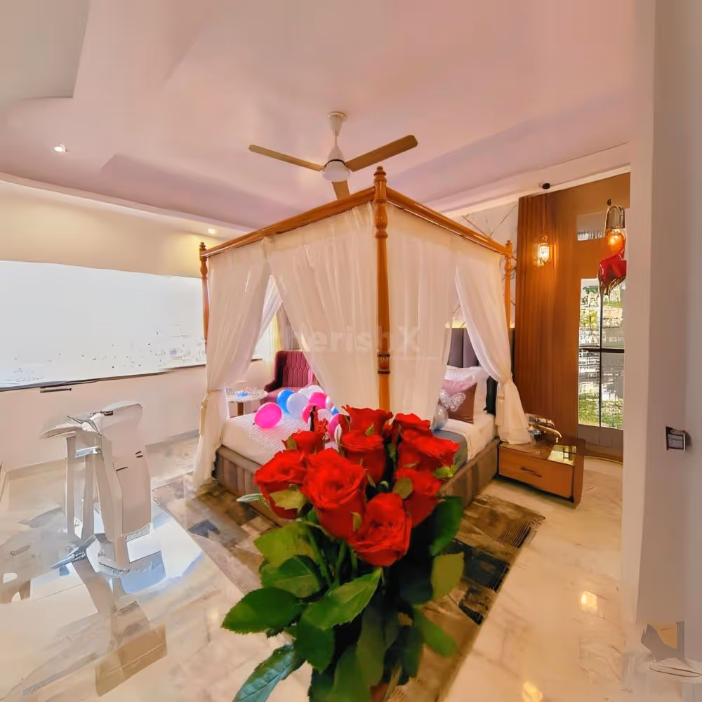 Immerse in romance with a candlelit dinner and cozy parda bed