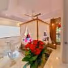 Immerse in romance with a candlelit dinner and cozy parda bed
