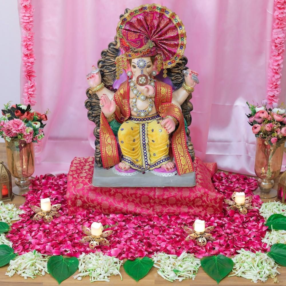 Ganesh chaturthi Elegant with the combination of real and artificial flowers