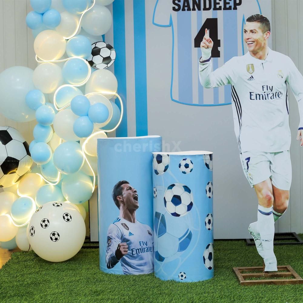 Combination of balloons, cutouts and neon light in this football decor