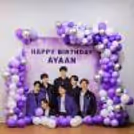 space with BTS magic and vibrant balloon arch