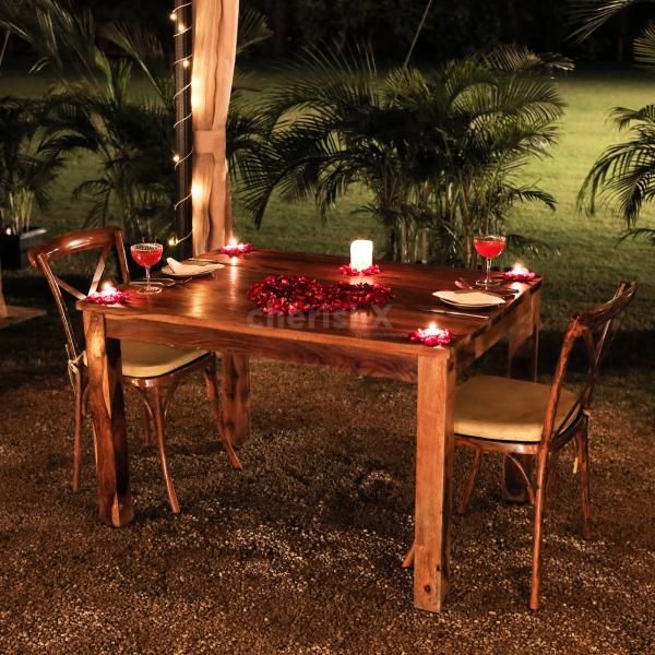 Cozy and intimate cabana dining experience with lanterns and candles