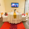 Experience a romantic private movie night with elegant table decor.