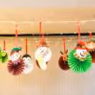 Celebrate Christmas with colorful paper rosettes and festive lights