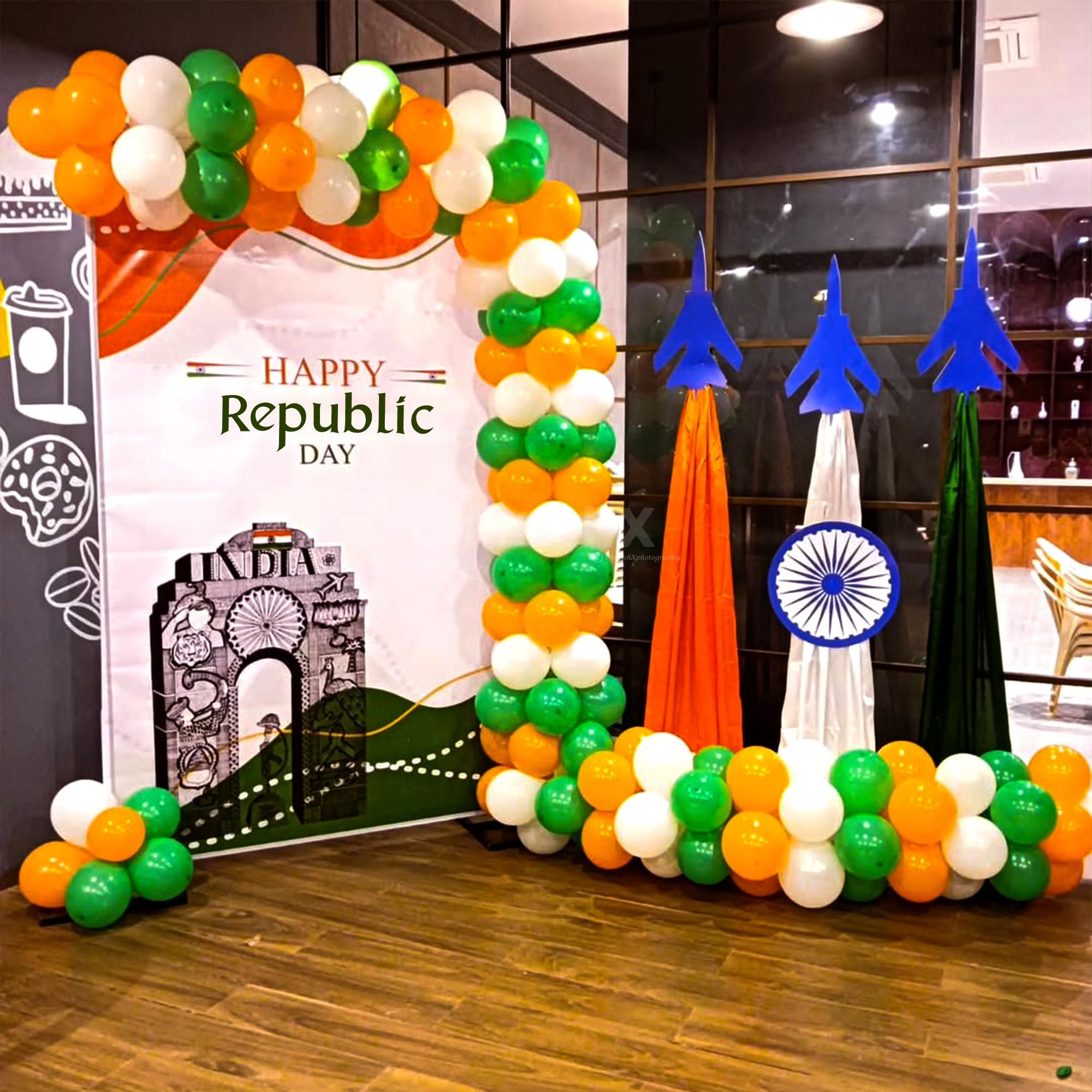 Celebrate freedom with a vibrant tri-colour balloon backdrop.