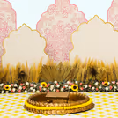Relish perfect moments with pastel pink and yellow backdrops and flamingo touches.