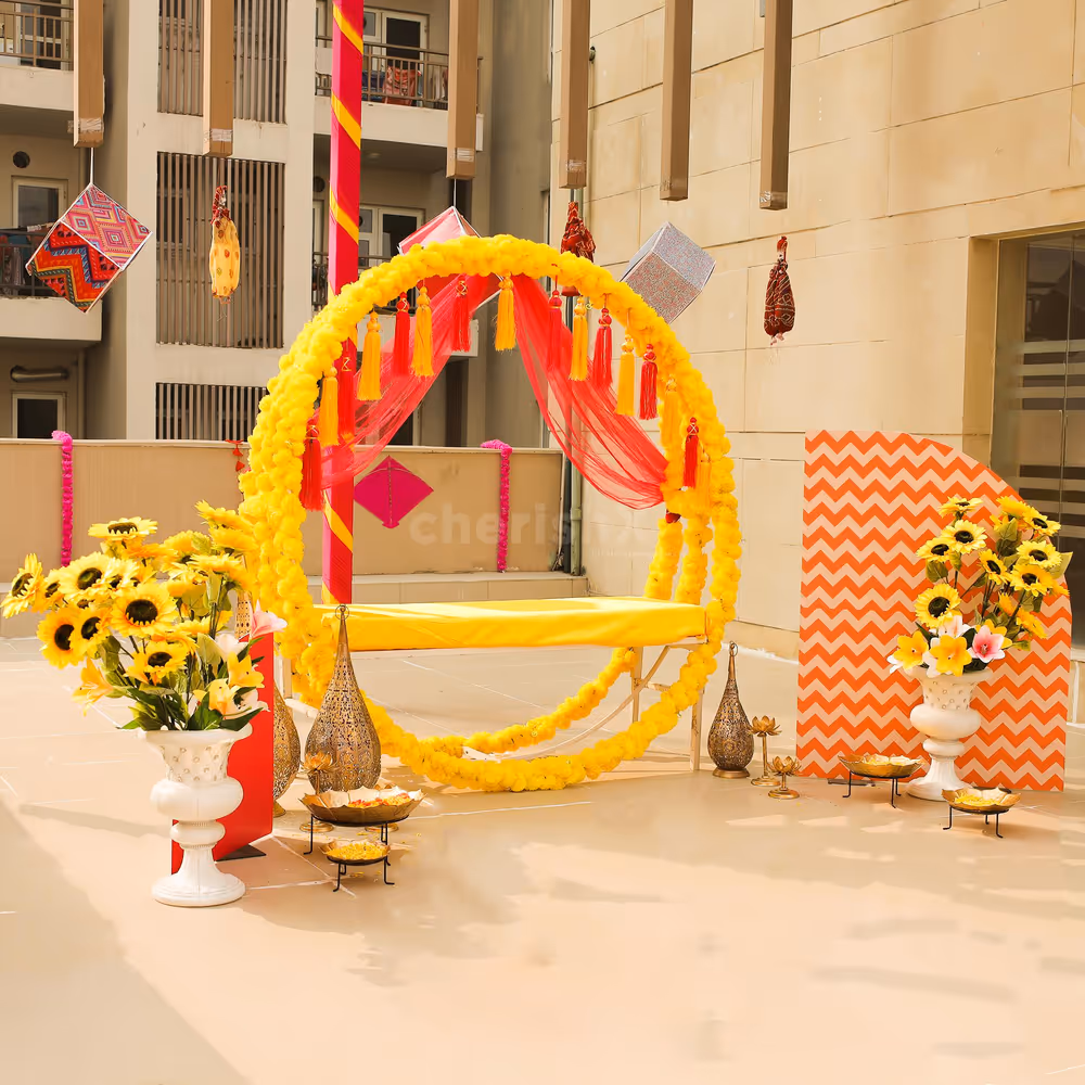 Dazzle your Haldi Mehndi with the beautiful yellow ring decor setup.