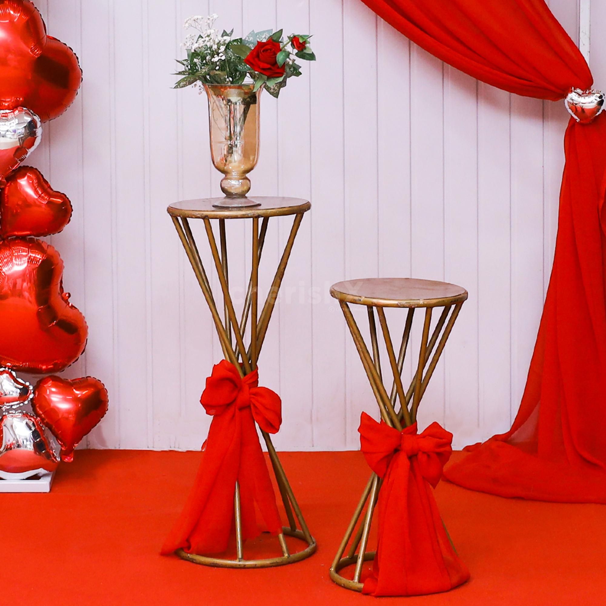 Celebrate love with this breathtaking red carpet and a vibrancy of the heart décor