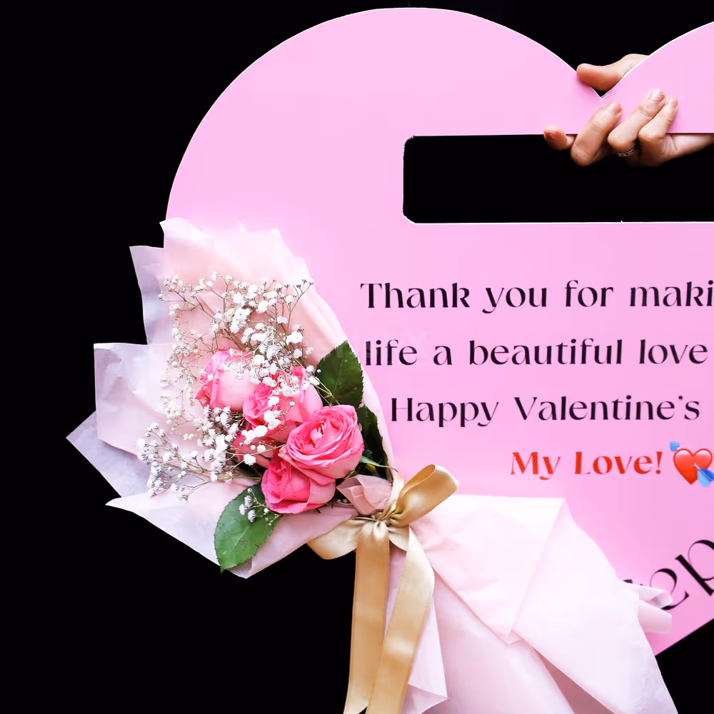 A lovely bouquet of fresh pink roses to accompany your words of love.