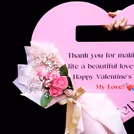A lovely bouquet of fresh pink roses to accompany your words of love.