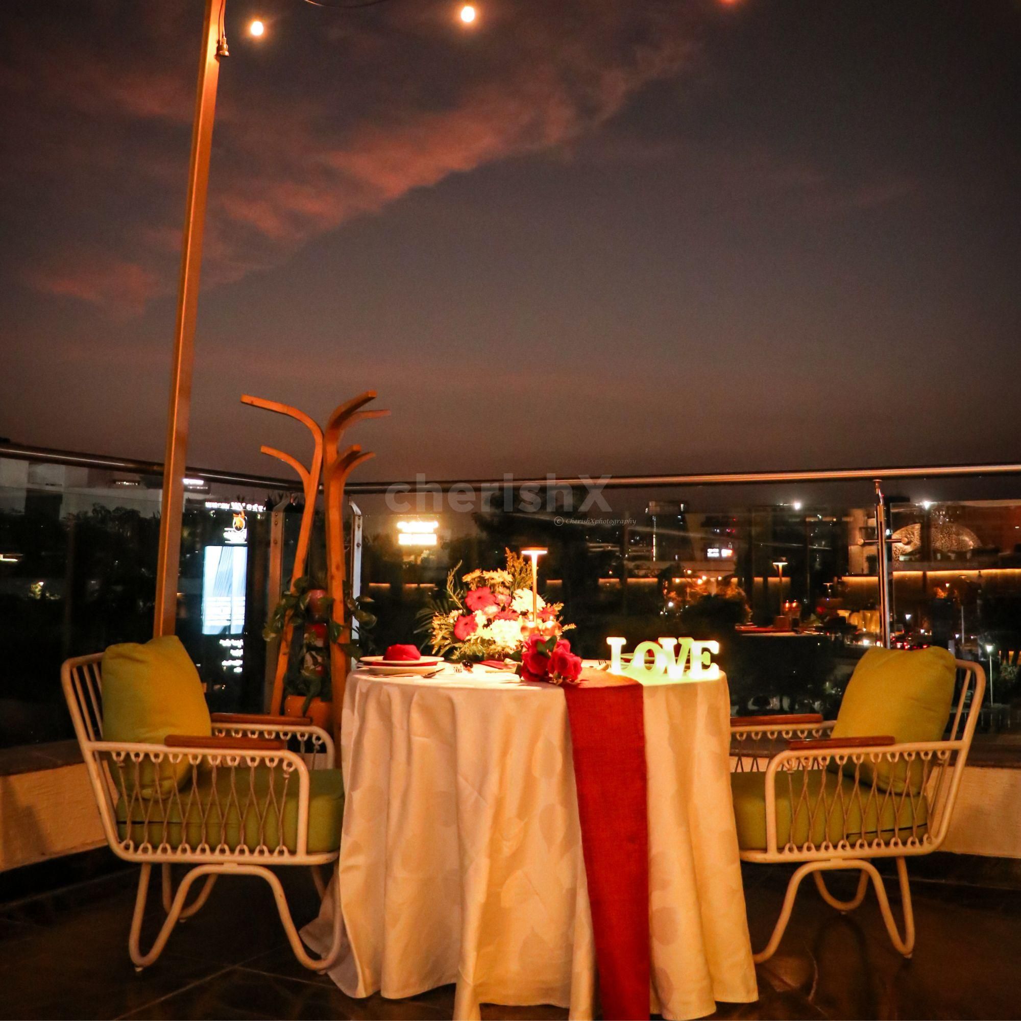 Panoramic View Dining: Romantic table setup with stunning panoramic views