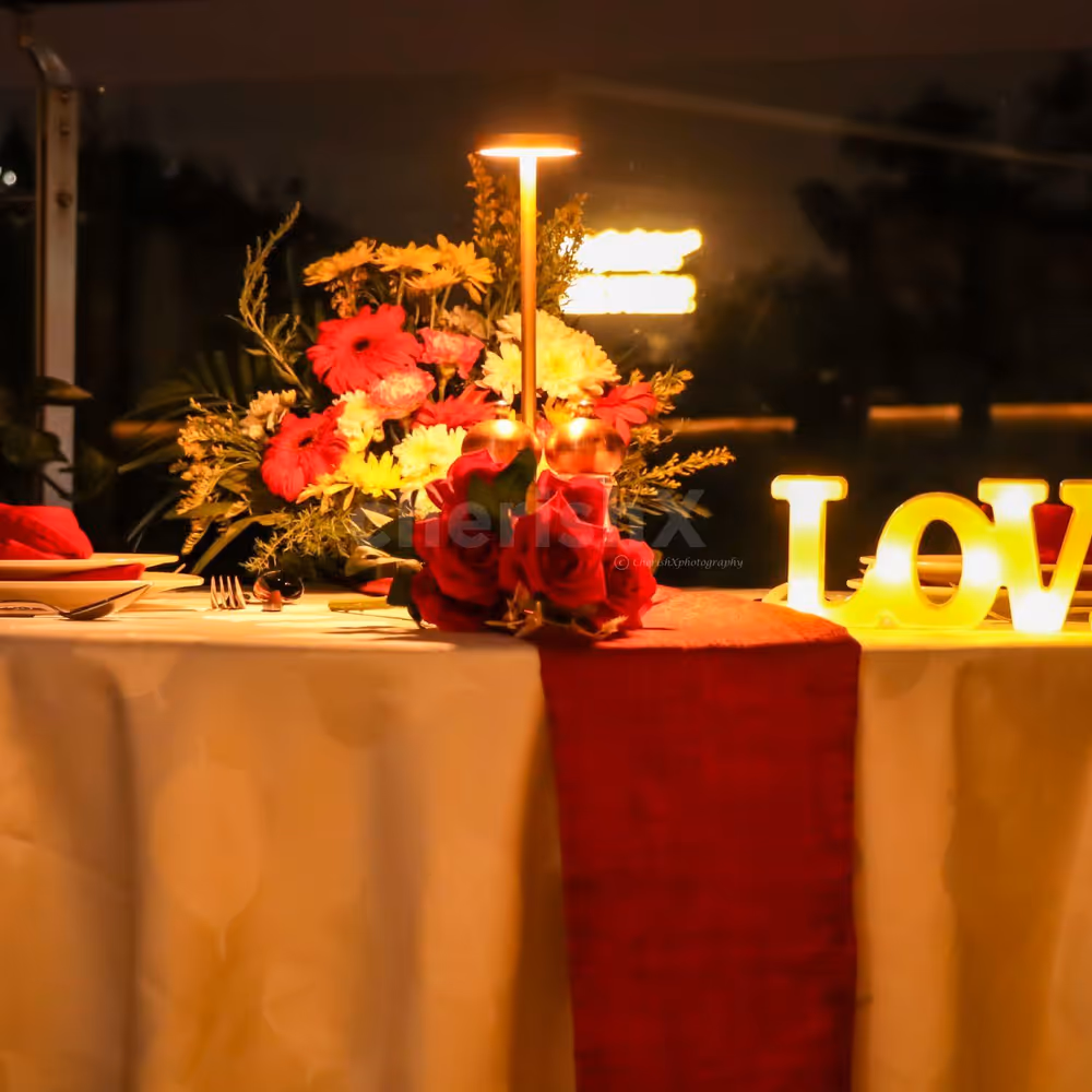 Flower Decorations: Beautifully adorned tables with elegant floral arrangements