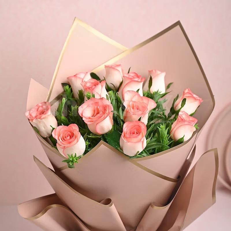 A graceful ensemble of delicate pink roses