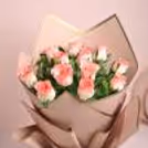 A graceful ensemble of delicate pink roses