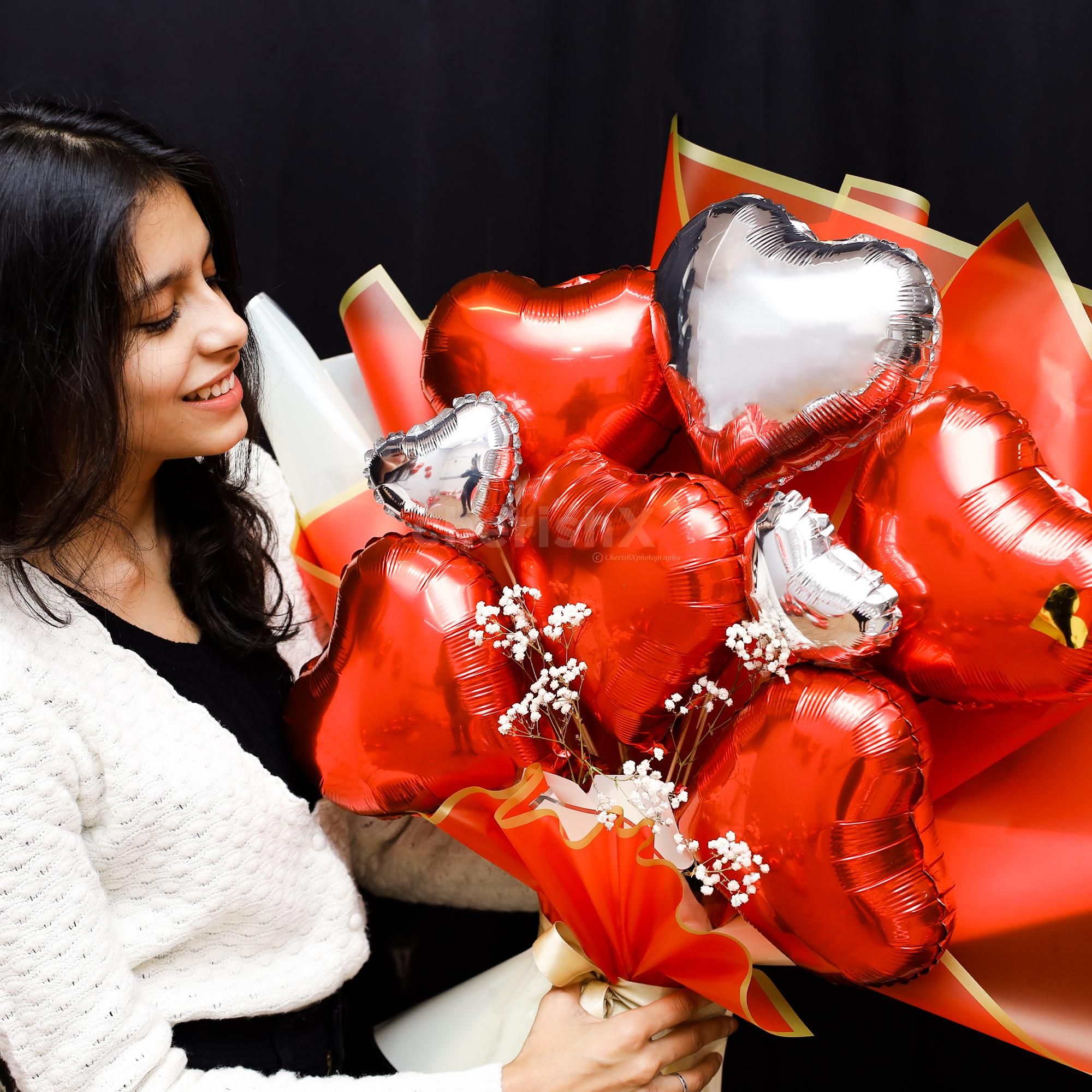 Make a bold statement of love with this stunning balloon bouquet!