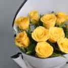 Bask in the golden glow of this enchanting bouquet