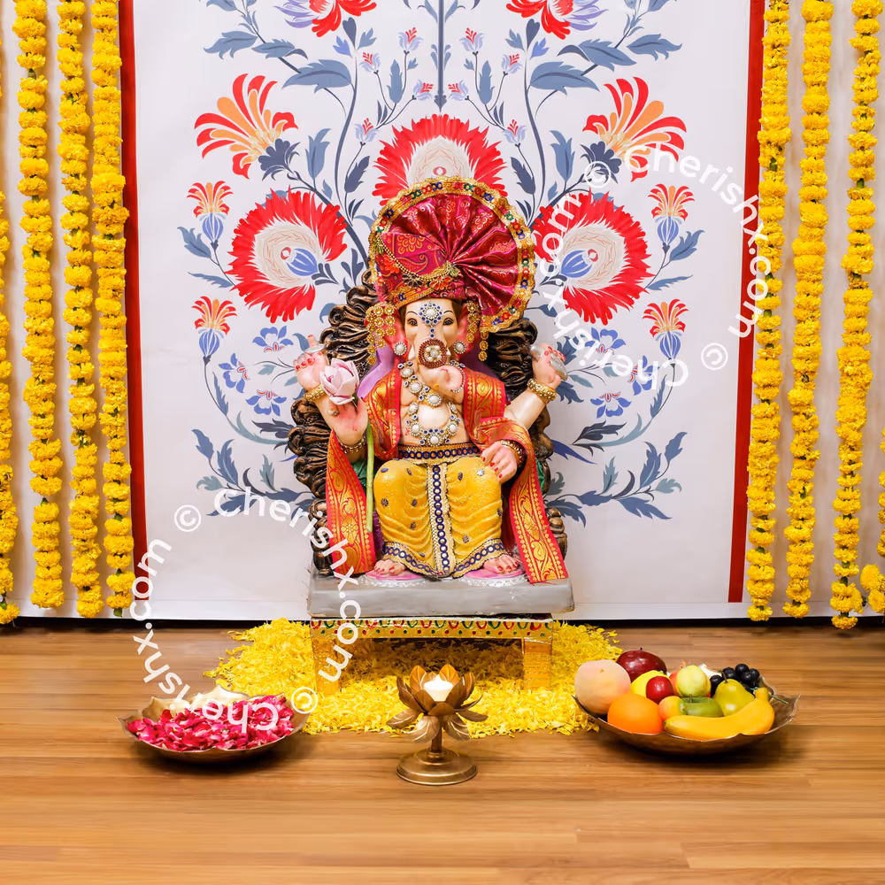 Marigold garlands on the flex add to the celebration charm