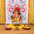 Marigold garlands on the flex add to the celebration charm