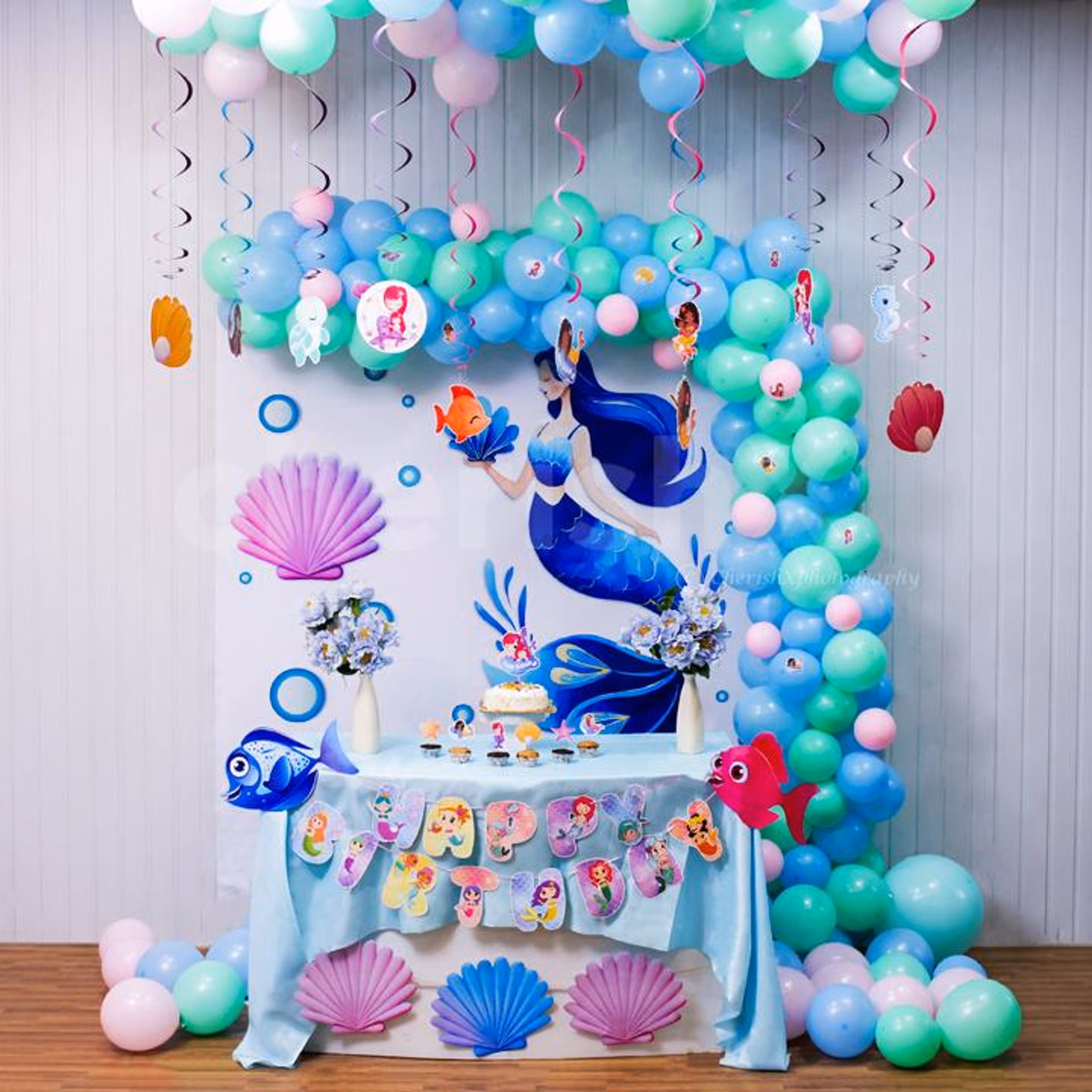 Fish swam in frosting while shells guarded the cupcake stash