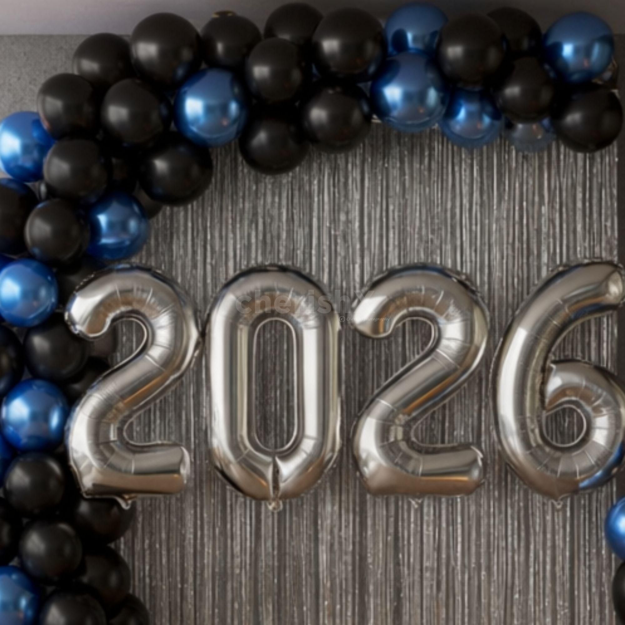 2026 Foil balloons float in the air with shiny silver glitter to add perfection to the decoration